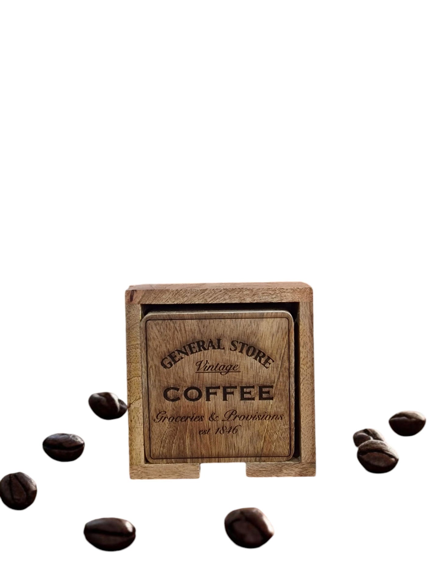 Wooden coaster holder with "General Store Coffee" logo and scattered coffee beans.