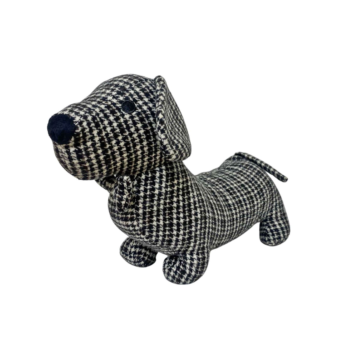 Grey herringbone fabric sausage dog doorstop used as a decorative home accessory