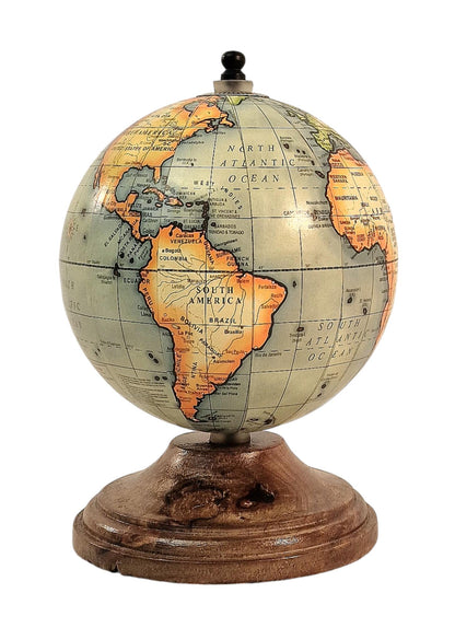 Vintage-style globe on a wooden stand, depicting continents and oceans with detailed labeling.