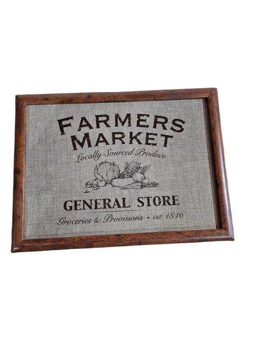 Framed print lap tray of a vintage general store design, featuring a building illustration, "Groceries & Provisions," and "est. 1846".