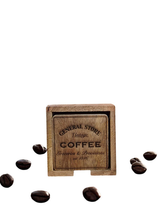 Wooden coaster holder with "General Store Coffee" logo and scattered coffee beans.