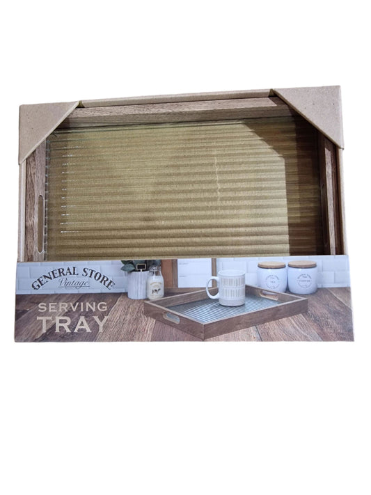 Wooden serving tray with a light grey/beige textured glass surface, displayed on a wooden surface.