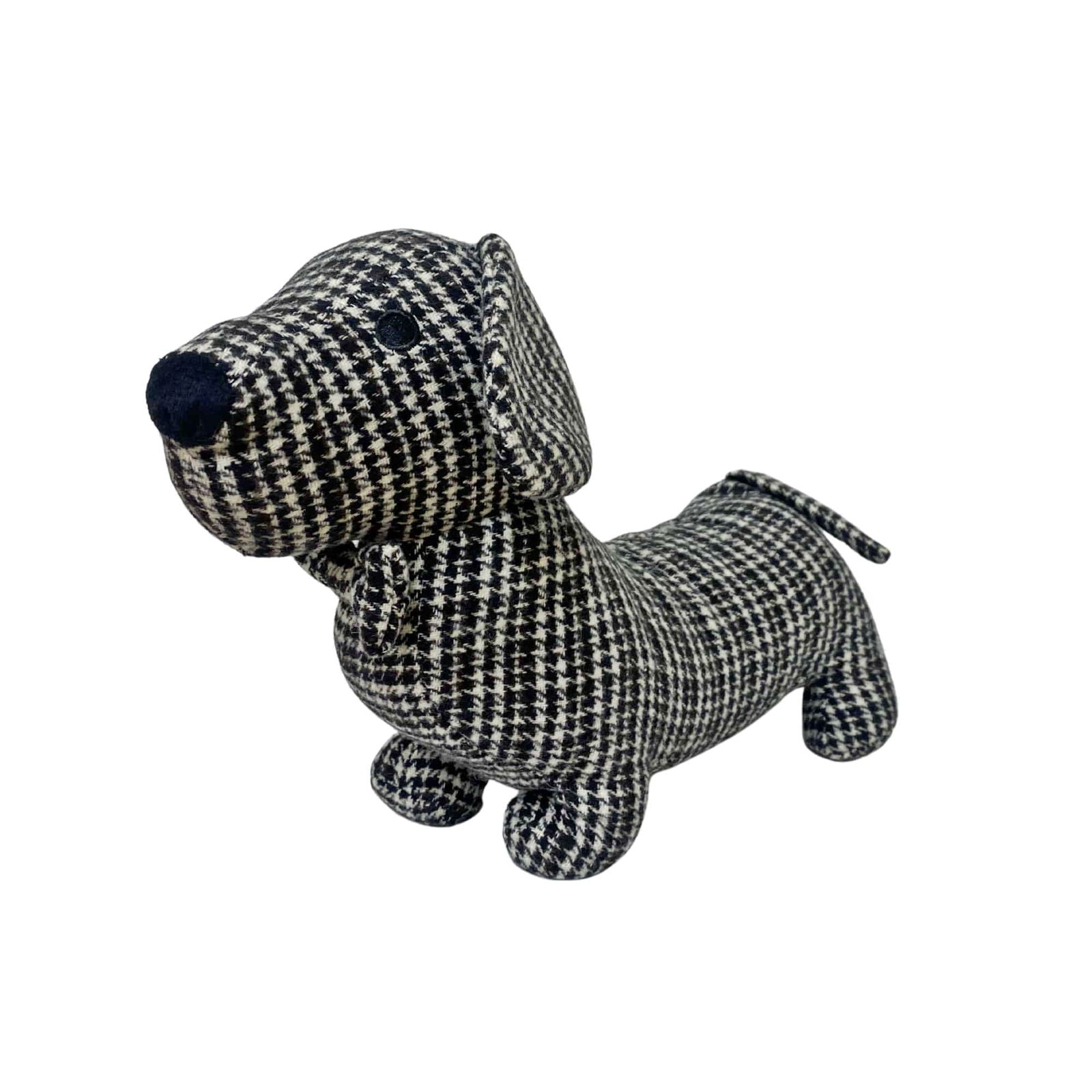 Grey herringbone fabric sausage dog doorstop used as a decorative home accessory